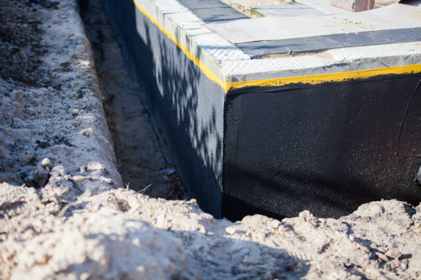Professional Waterproofing technician working in Berry, KY